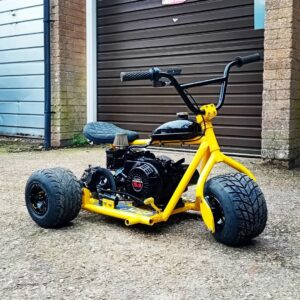 yellow mini trike